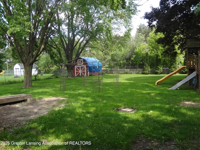 14311 Chandler Rd, Bath, MI 48808 - view of yard featuring a playground
