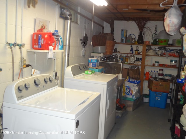 14311 Chandler Rd, Bath, MI 48808 - laundry room featuring independent washer and dryer and concrete block wall