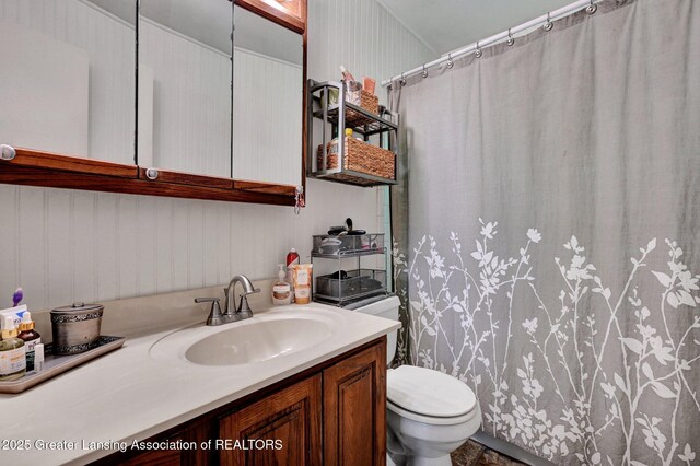 14311 Chandler Rd, Bath, MI 48808 - full bath featuring vanity and a shower with shower curtain