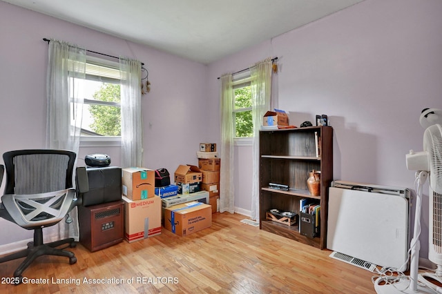 14311 Chandler Rd, Bath, MI 48808 - home office featuring light wood finished floors