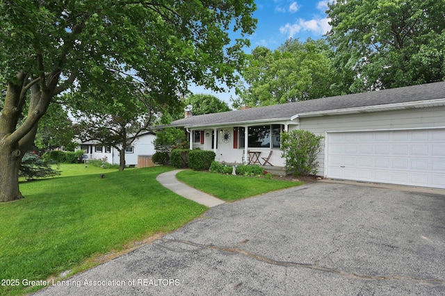 14311 Chandler Rd, Bath, MI 48808 - ranch-style house featuring a front lawn, driveway, a garage, a chimney, and roof with shingles