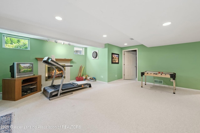 1209 Windale Pl, East Lansing, MI 48823 - workout room featuring carpet floors, recessed lighting, baseboards, and plenty of natural light