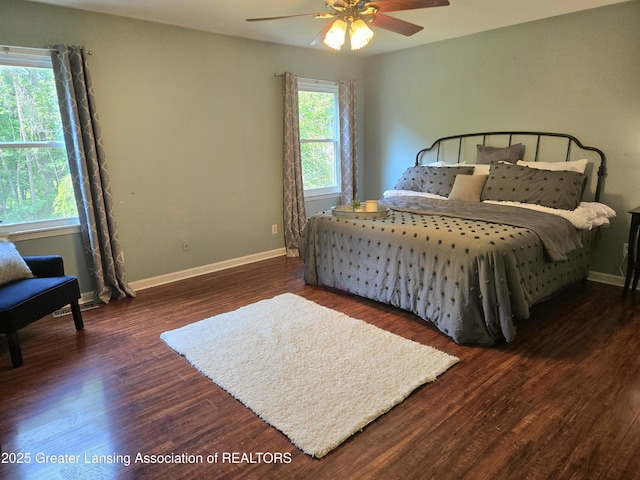 4423 Hyatt St, Eaton Rapids, MI 48827 - bedroom featuring wood finished floors, baseboards, and a ceiling fan