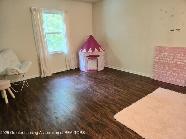 4423 Hyatt St, Eaton Rapids, MI 48827 - unfurnished room with wood finished floors and baseboards