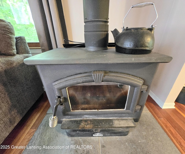 4423 Hyatt St, Eaton Rapids, MI 48827 - detailed view of wood finished floors and baseboards