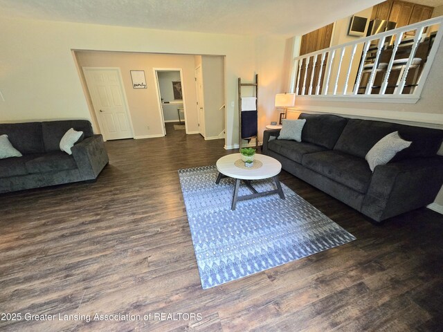 4423 Hyatt St, Eaton Rapids, MI 48827 - living room with wood finished floors and baseboards