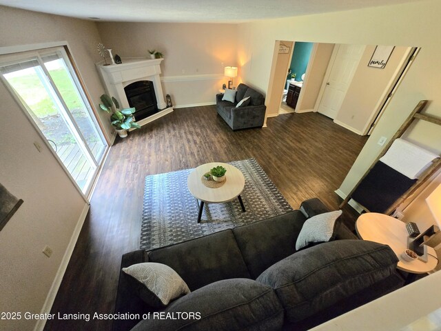 4423 Hyatt St, Eaton Rapids, MI 48827 - living area featuring wood finished floors and baseboards
