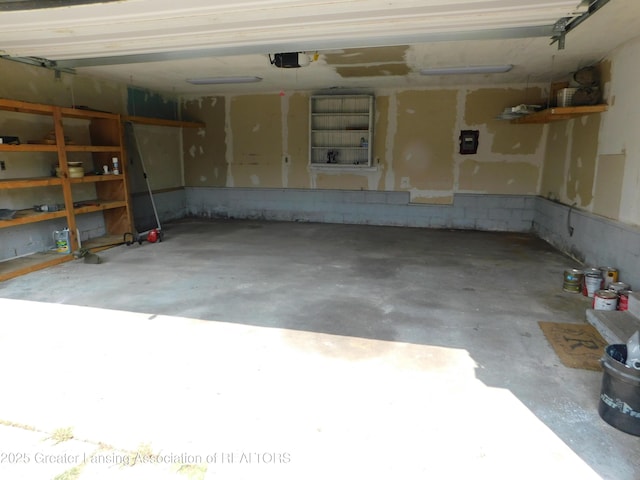 1305 May St, Lansing, MI 48906 - garage with a garage door opener