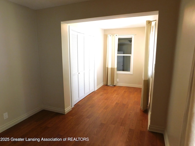 1305 May St, Lansing, MI 48906 - hall featuring wood finished floors and baseboards