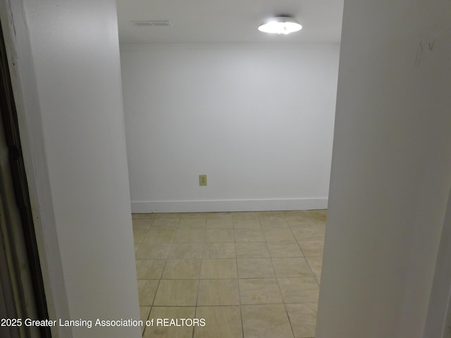 1305 May St, Lansing, MI 48906 - unfurnished room with baseboards