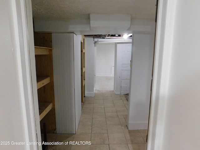 1305 May St, Lansing, MI 48906 - corridor featuring light tile patterned floors