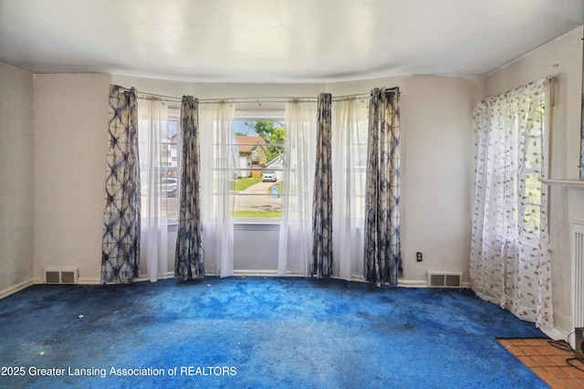 1615 Inverness Ave, Lansing, MI 48915 - carpeted spare room featuring baseboards