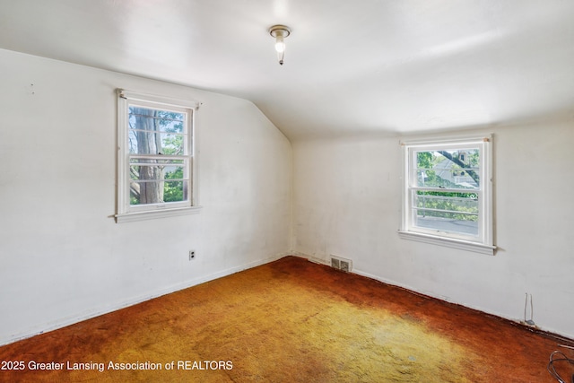 1615 Inverness Ave, Lansing, MI 48915 - bonus room with carpet flooring and lofted ceiling