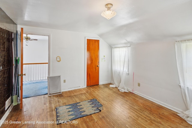 1615 Inverness Ave, Lansing, MI 48915 - additional living space featuring hardwood / wood-style flooring, lofted ceiling, and baseboards