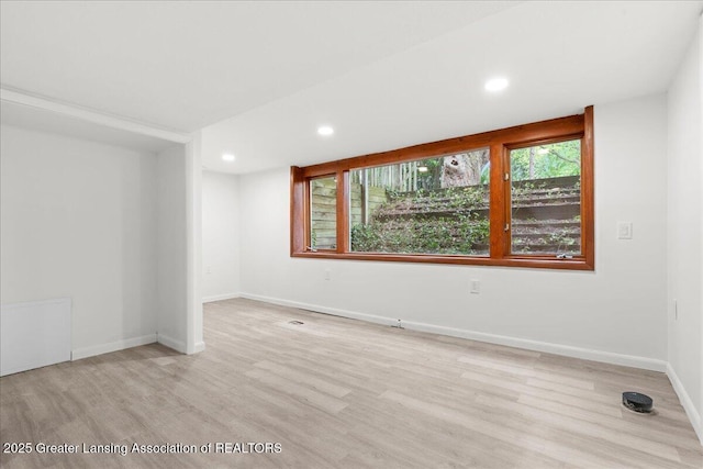 1424 Cedarhill Dr, East Lansing, MI 48823 - spare room featuring recessed lighting, light wood-type flooring, and baseboards