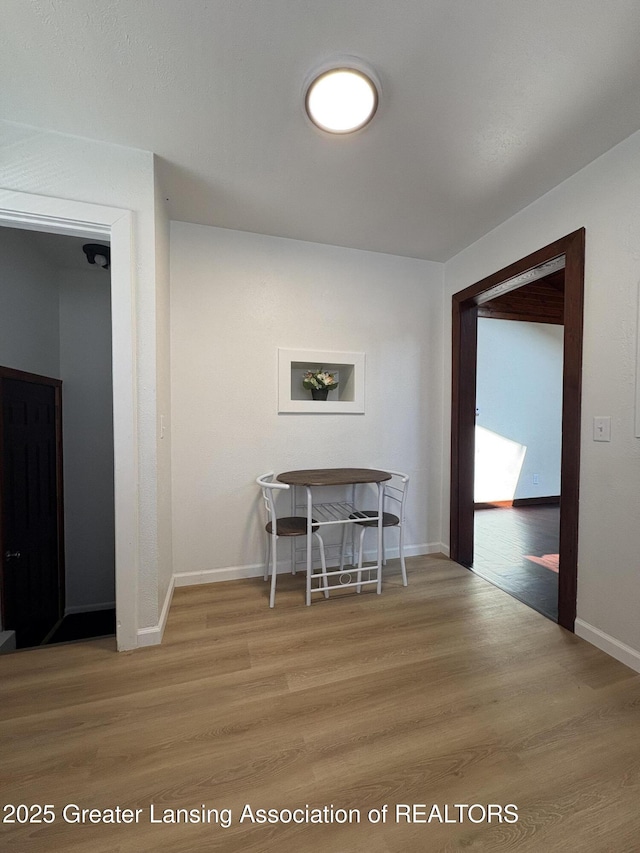 1524 Roseneath Ave, Lansing, MI 48915 - dining area with wood finished floors and baseboards