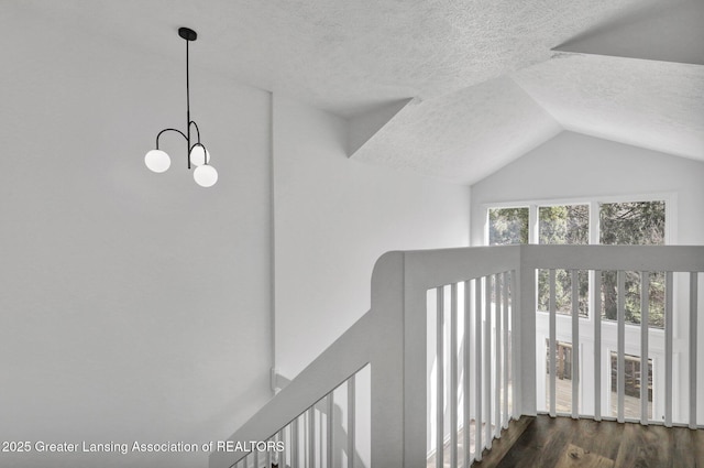 4003 Norfolk Ct, Lansing, MI 48910 - detailed view of a textured ceiling, wood finished floors, and a chandelier