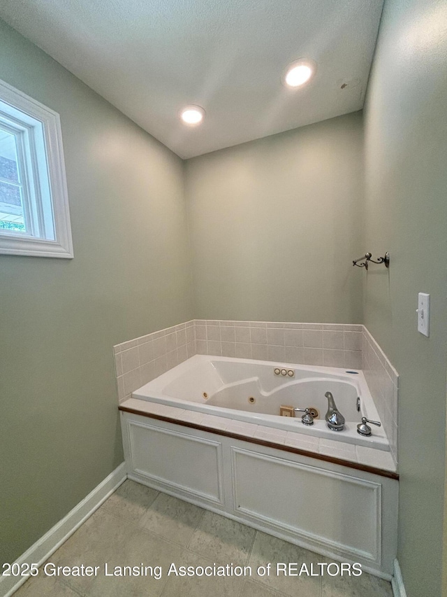1826 Battle Creek Rd, Charlotte, MI 48813 - full bath with a tub with jets and baseboards