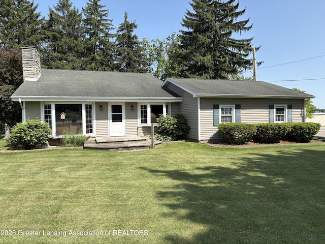 1064 W Shepherd St, Charlotte, MI 48813 - single story home featuring a front yard and a chimney