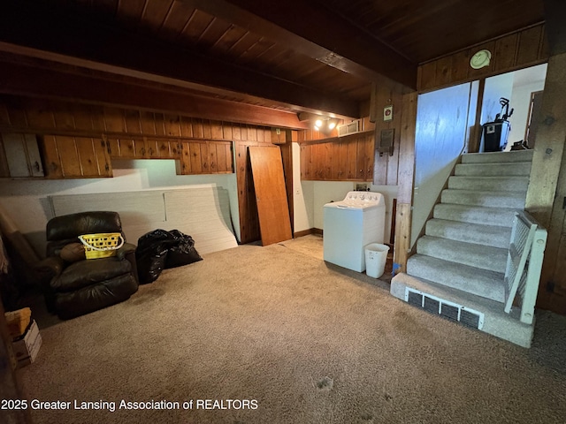 1064 W Shepherd St, Charlotte, MI 48813 - finished below grade area with washer / dryer, light colored carpet, wooden walls, wood ceiling, and stairway