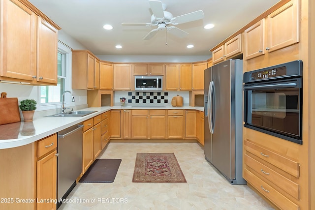1005 Old Erin Way, Lansing, MI 48917 - kitchen with appliances with stainless steel finishes, a sink, light brown cabinetry, a ceiling fan, and recessed lighting