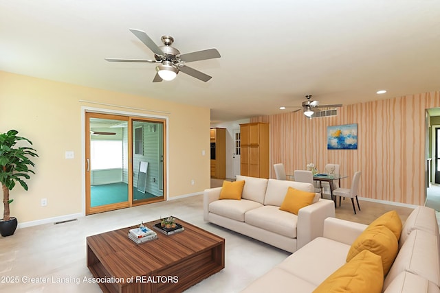 1005 Old Erin Way, Lansing, MI 48917 - living area featuring ceiling fan, baseboards, carpet floors, and recessed lighting