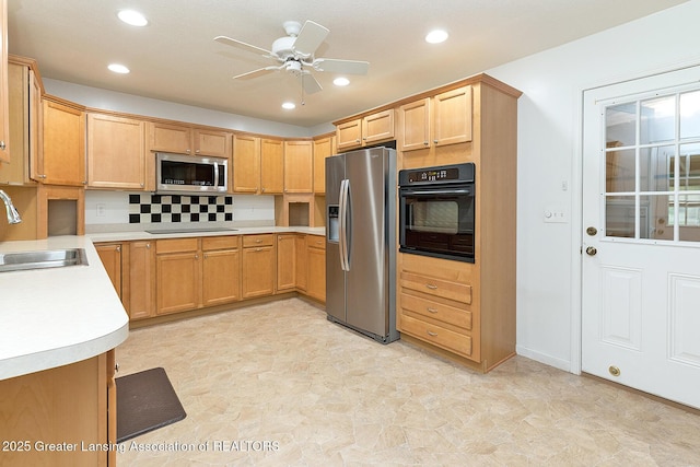 1005 Old Erin Way, Lansing, MI 48917 - kitchen featuring black appliances, a sink, recessed lighting, light countertops, and a ceiling fan
