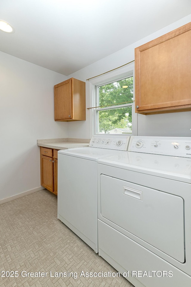 1005 Old Erin Way, Lansing, MI 48917 - washroom featuring cabinet space, independent washer and dryer, and baseboards