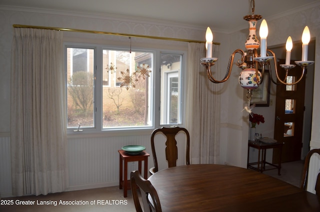 408 Whitehills Dr, East Lansing, MI 48823 - dining space featuring a chandelier and ornamental molding