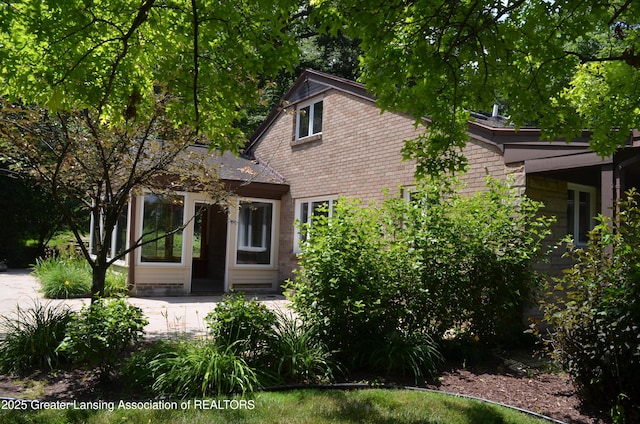 408 Whitehills Dr, East Lansing, MI 48823 - view of front of house with brick siding