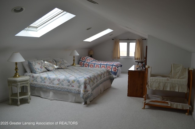 408 Whitehills Dr, East Lansing, MI 48823 - carpeted bedroom featuring a skylight and lofted ceiling