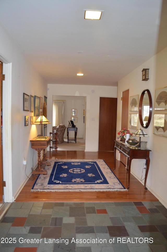 408 Whitehills Dr, East Lansing, MI 48823 - entrance foyer with wood finished floors and baseboards