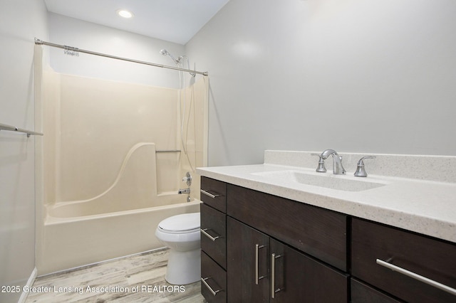 1321 Saint James Pl, Chelsea, MI 48118 - full bath featuring tub / shower combination, vanity, wood finished floors, and toilet