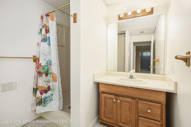 1321 Saint James Pl, Chelsea, MI 48118 - bathroom featuring vanity, a shower with curtain, and baseboards