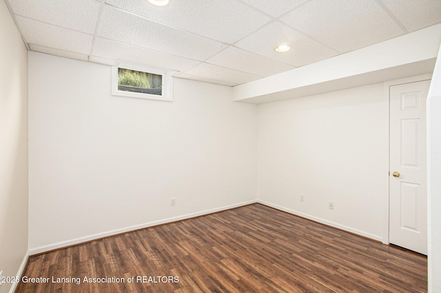 1321 Saint James Pl, Chelsea, MI 48118 - below grade area with dark wood finished floors, baseboards, a drop ceiling, and recessed lighting