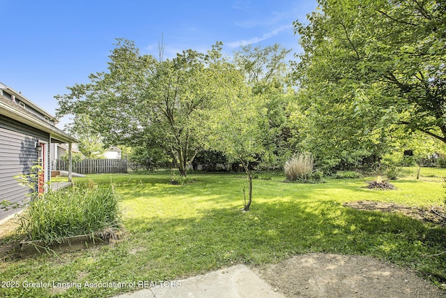 1321 Saint James Pl, Chelsea, MI 48118 - view of yard with an outdoor fire pit