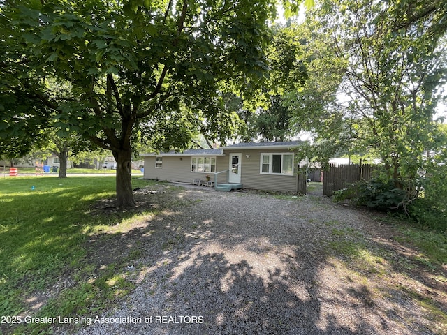 4208 Richmond St, Lansing, MI 48911 - view of front facade with gravel driveway
