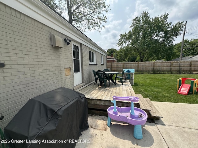 2107 Westbury Rd, Lansing, MI 48906 - wooden terrace featuring outdoor dining space and area for grilling