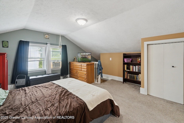 1928 Teel Ave, Lansing, MI 48910 - carpeted bedroom with vaulted ceiling, a textured ceiling, and cooling unit