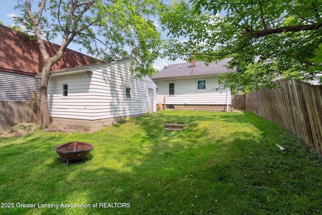 1928 Teel Ave, Lansing, MI 48910 - view of yard with a fire pit