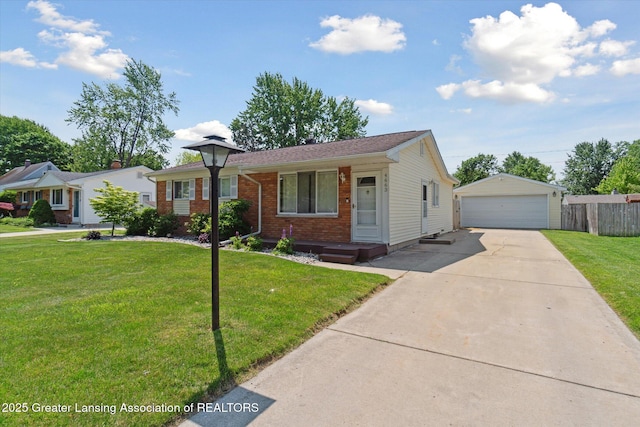 4663 Sycamore St, Holt, MI 48842 - view of front of house featuring an outdoor structure, a garage, and brick siding