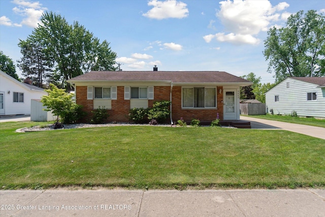 4663 Sycamore St, Holt, MI 48842 - view of front of home with brick siding