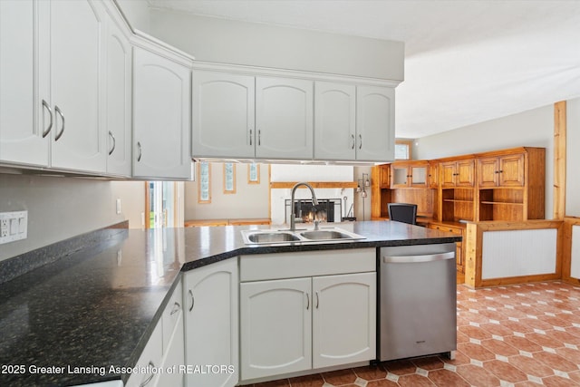 4663 Sycamore St, Holt, MI 48842 - kitchen with dishwasher, a sink, white cabinetry, and plenty of natural light