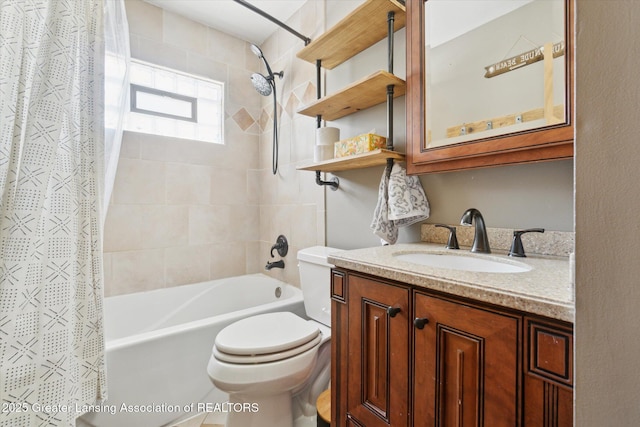 4663 Sycamore St, Holt, MI 48842 - full bathroom featuring toilet, shower / tub combo, and vanity