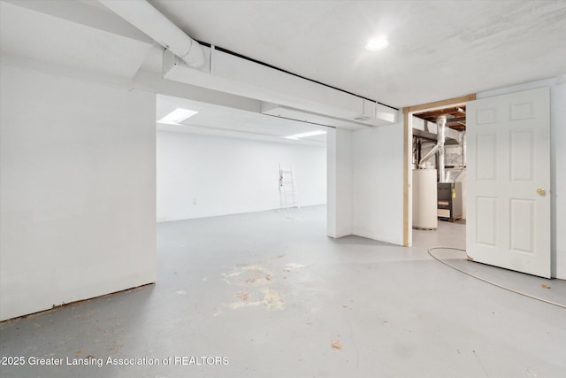 4663 Sycamore St, Holt, MI 48842 - basement with water heater