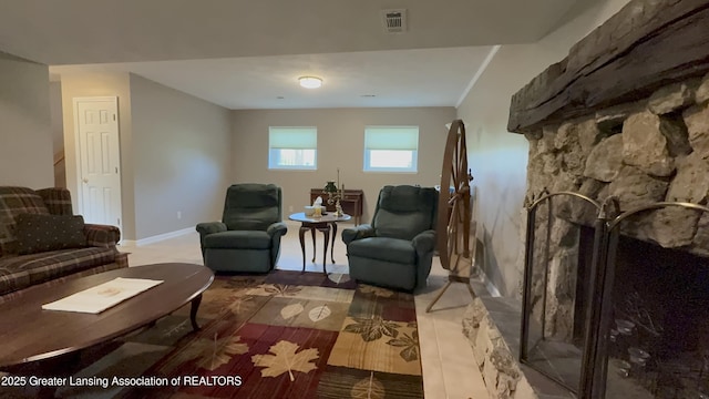 9216 S Grove Rd, Dewitt, MI 48820 - living area with baseboards, a large fireplace, and wood finished floors