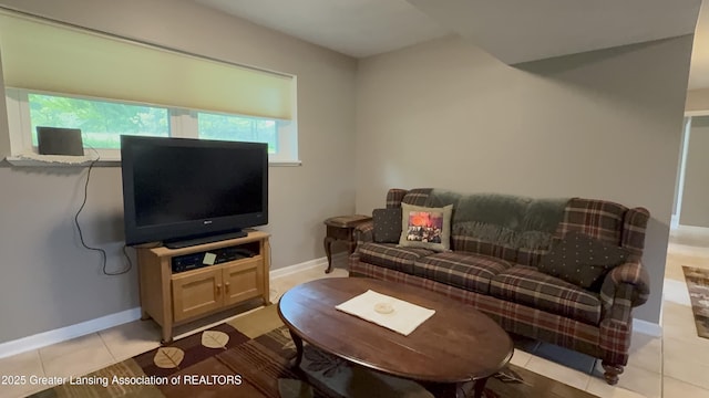 9216 S Grove Rd, Dewitt, MI 48820 - living room with plenty of natural light, baseboards, and light tile patterned floors