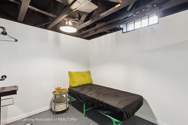 1098 Brookside Dr, Grand Ledge, MI 48837 - bedroom featuring concrete floors