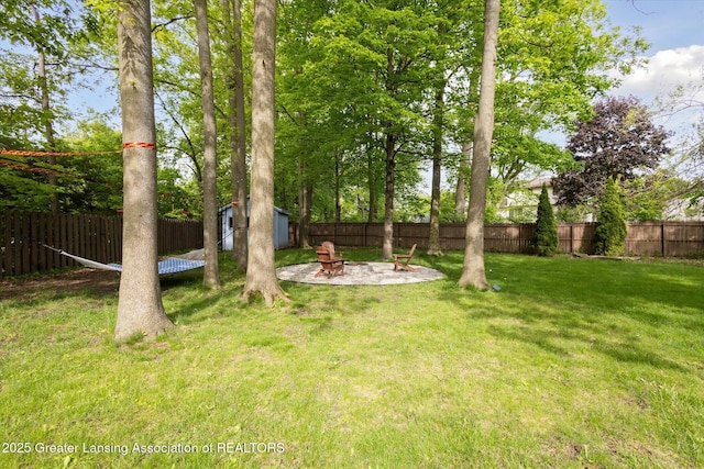 1098 Brookside Dr, Grand Ledge, MI 48837 - view of yard with a fire pit