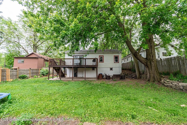 522 W Hodge Ave, Lansing, MI 48910 - rear view of property with a deck and stairs